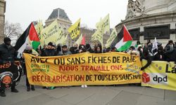 Paris'te hükümetin tartışmalı göç yasası protesto edildi